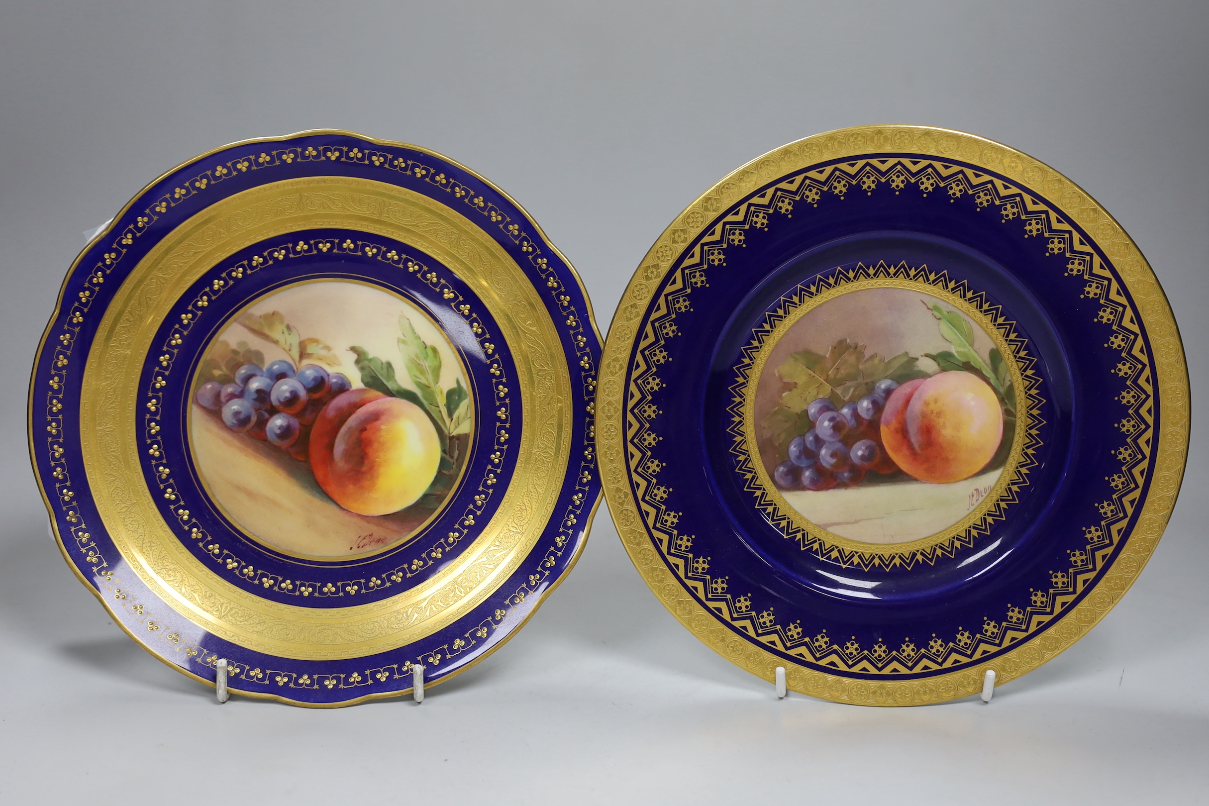 Two Minton fruit painted plates, both signed, one K. Dean, 23cm diameter